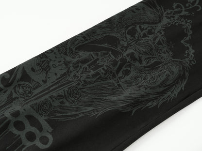 A close-up of a black fabric product, likely a sleeve or bandana, featuring a dark gray gothic graphic of a skull wearing a crown of thorns and holding a sword, with roses and ornate filigree details.